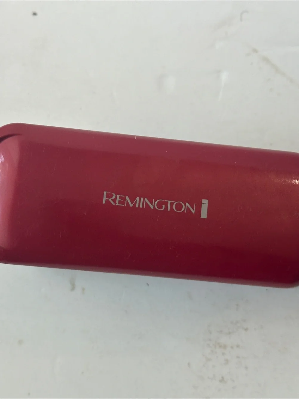 Remington Handheld Hair Straightener with Blue Backlit Display - Black and Red.